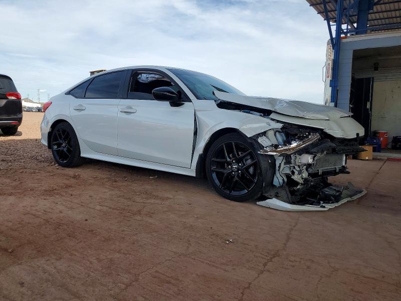 Photo 4 from auction – 2023 HONDA CIVIC SPOR with VIN 2HGFE2F55PH529641