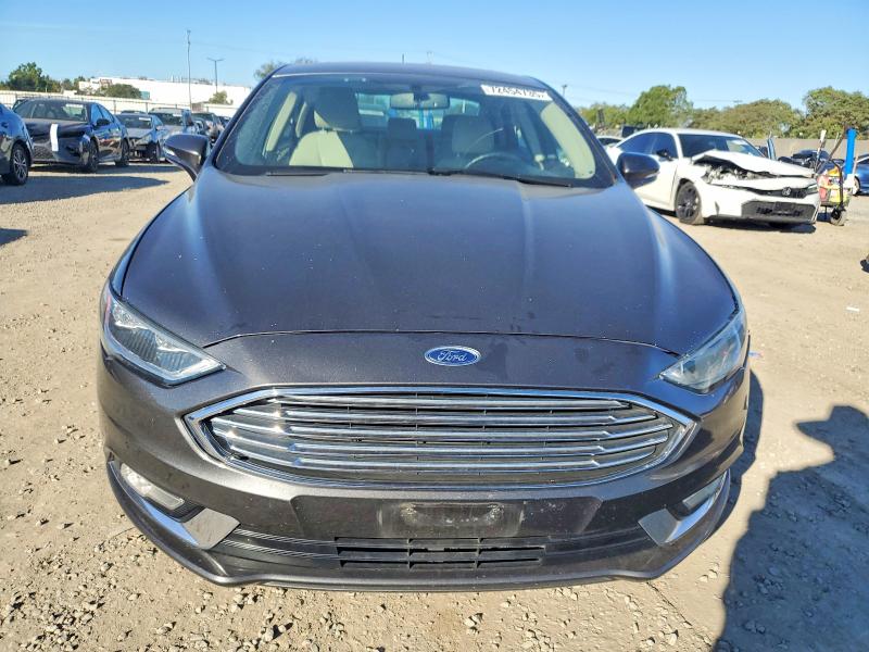 Photo 5 from auction – 2018 FORD FUSION with VIN 3FA6P0RU0JR131612
