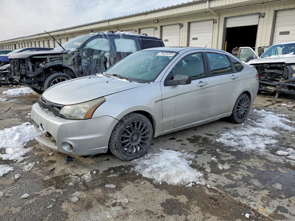 FORD FOCUS SES 2010 with VIN 1FAHP3GNXAW185969 - Photo from auction