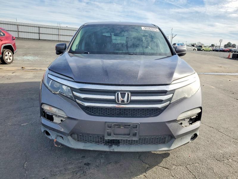 Photo 5 from auction – 2018 HONDA PILOT EXL with VIN 5FNYF6H53JB050205