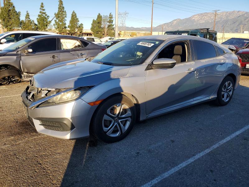 HONDA CIVIC LX 2018 with VIN 2HGFC2F58JH528531 - Photo from auction