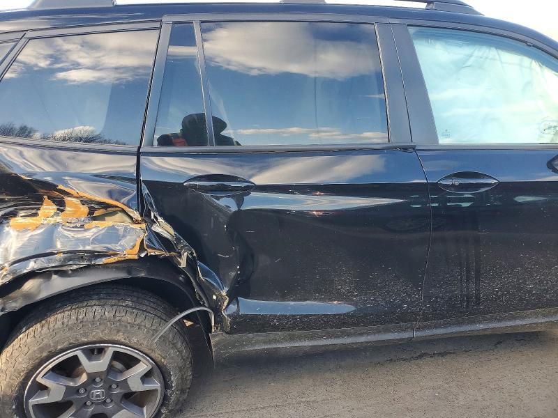 Photo 11 from auction – 2022 HONDA PASSPORT T with VIN 5FNYF8H60NB030956