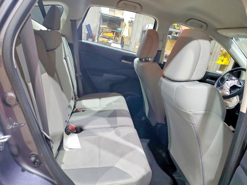 Photo 11 from auction – 2016 HONDA CR-V LX with VIN 5J6RM4H35GL022077