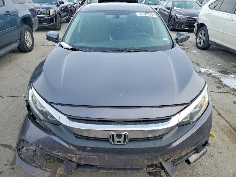 Photo 5 from auction – 2018 HONDA CIVIC EX with VIN 19XFC1F34JE000620