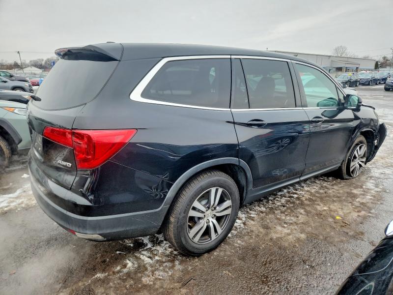 Photo 3 from auction – 2016 HONDA PILOT EXLN with VIN 5FNYF6H74GB106484
