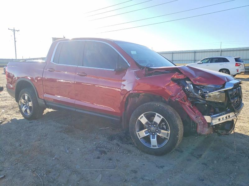 Photo 4 from auction – 2024 HONDA RIDGELINE with VIN 5FPYK3F54RB013633