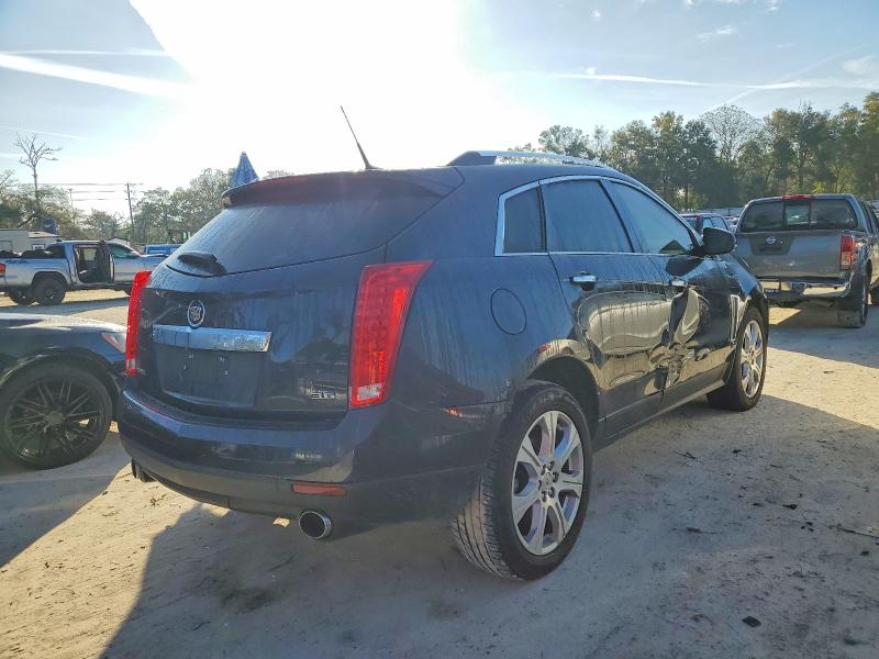 Photo 3 from auction – 2014 CADILLAC SRX PERFOR with VIN 3GYFNCE38ES547897
