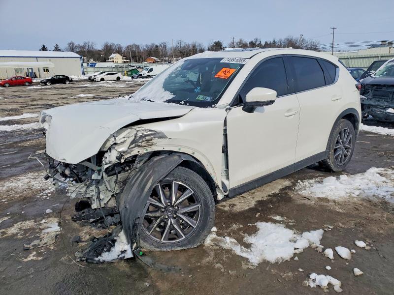MAZDA CX-5 2018 with VIN JM3KFADM9J1461453 - Photo from auction