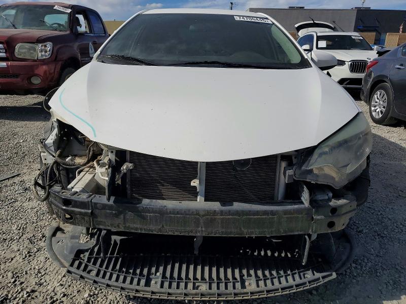 Photo 5 from auction – 2015 TOYOTA COROLLA L with VIN 5YFBURHE1FP219338