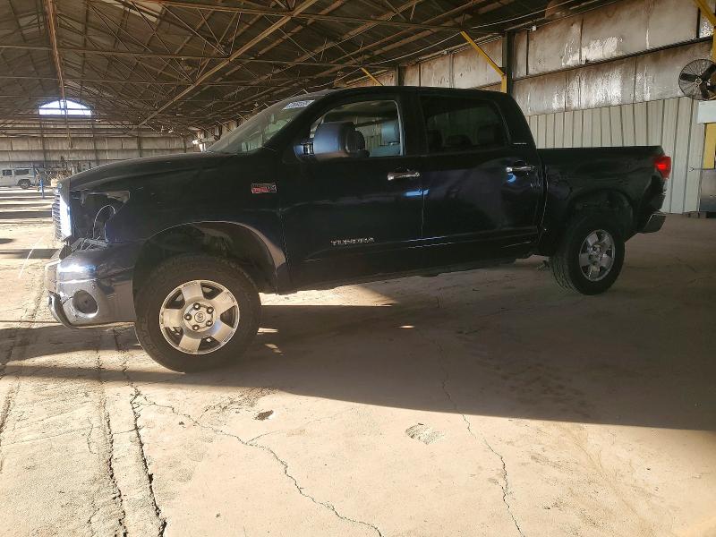TOYOTA TUNDRA 2010 with VIN 5TFHW5F16AX097776 - Photo from auction