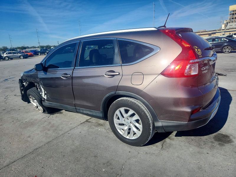 Photo 2 from auction – 2016 HONDA CR-V with VIN 2HKRM3H77GH508669