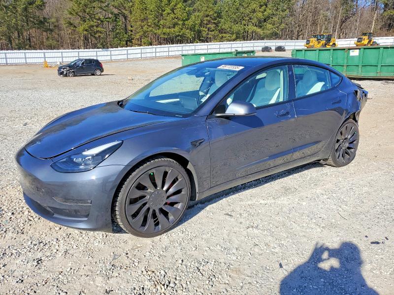 TESLA MODEL 3 2023 with VIN 5YJ3E1EC6PF713052 - Photo from auction