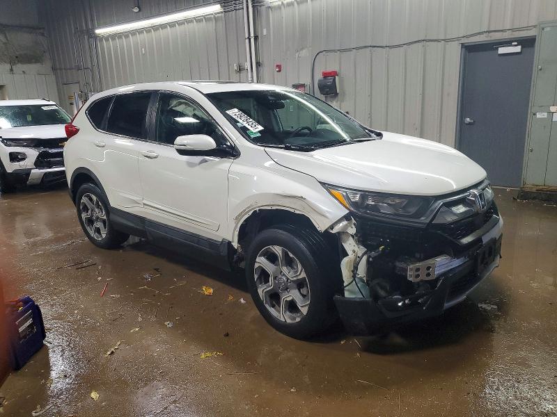 Photo 4 from auction – 2018 HONDA CR-V with VIN 5J6RW2H52JL006359
