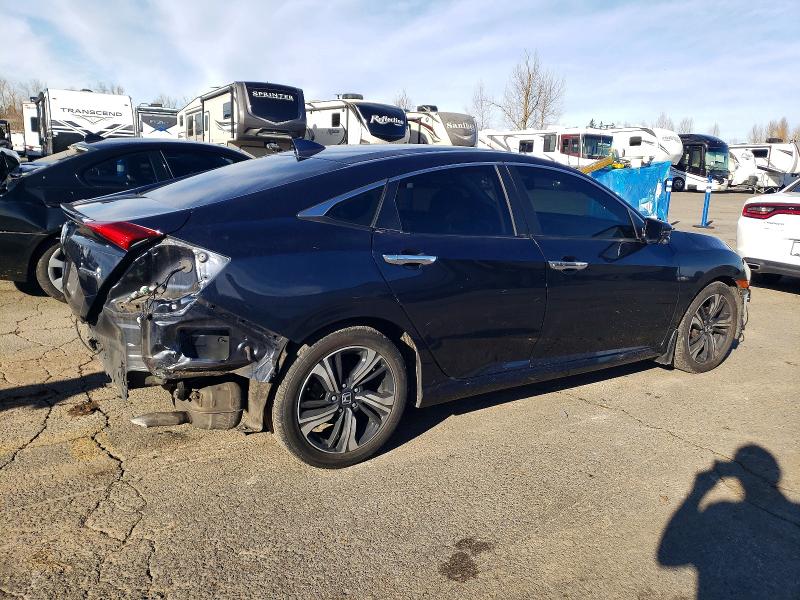 Photo 3 from auction – 2016 HONDA CIVIC TOUR with VIN 19XFC1F95GE216683