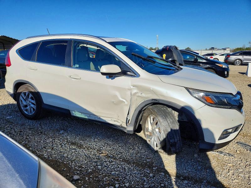 Photo 4 from auction – 2015 HONDA CR-V EXL with VIN 5J6RM4H79FL133829