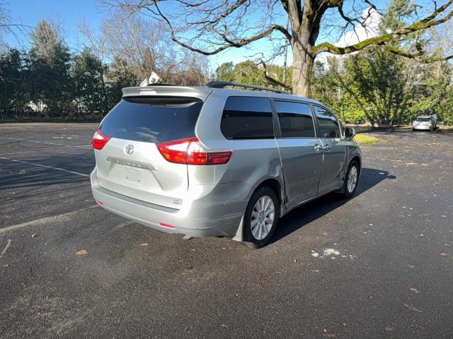 Photo 4 from auction – 2015 TOYOTA SIENNA LE with VIN 5TDJK3DC6FS127345
