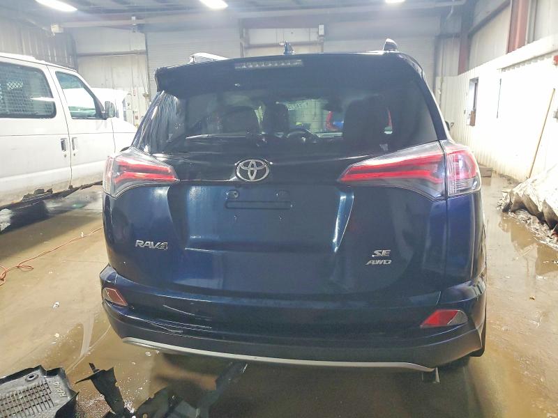 Photo 6 from auction – 2018 TOYOTA RAV4 SE with VIN JTMJFREV3JJ719427
