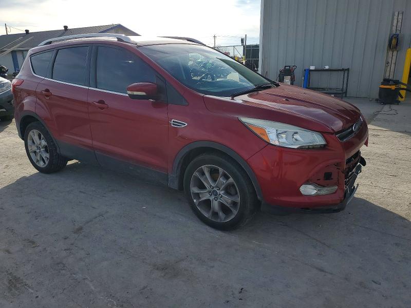 Photo 4 from auction – 2015 FORD ESCAPE TIT with VIN 1FMCU0JX2FUB45597