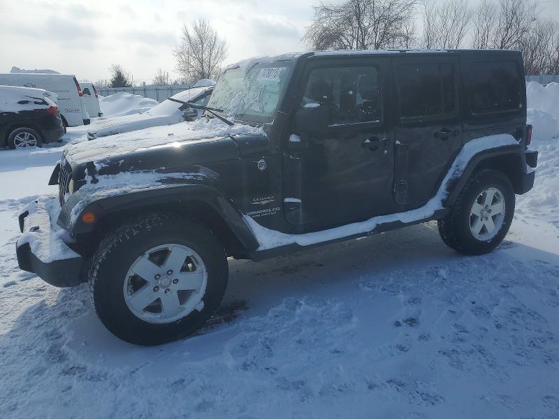 JEEP WRANGLER U 2011 с VIN 1J4BA5H13BL609451 - Фото с аукциона
