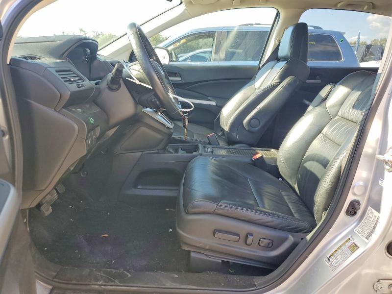 Photo 7 from auction – 2014 HONDA CR-V with VIN 2HKRM3H72EH557873