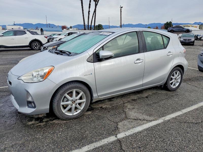 TOYOTA PRIUS C 2014 with VIN JTDKDTB3XE1082052 - Photo from auction
