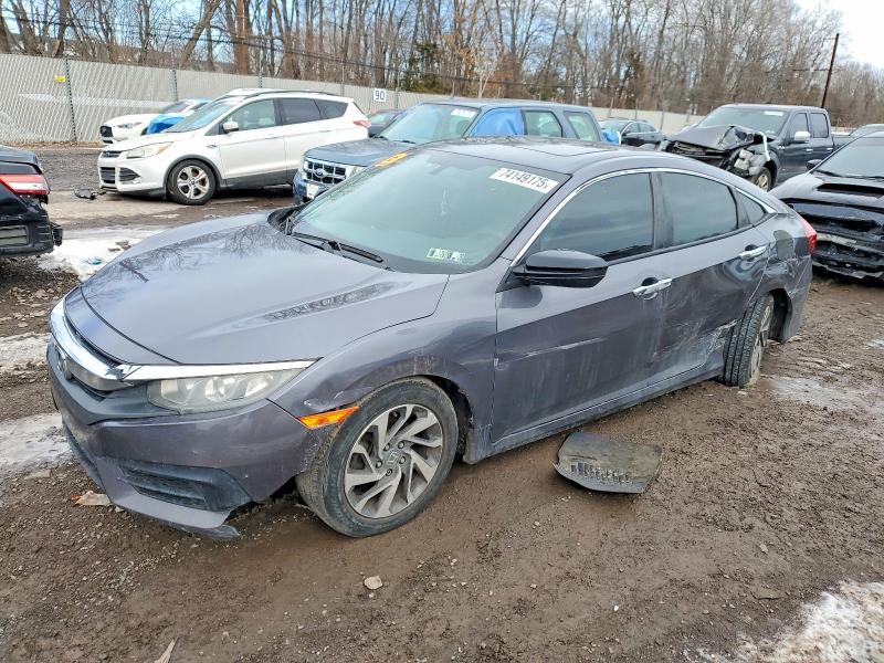 HONDA CIVIC EX 2017 with VIN 2HGFC2F7XHH574809 - Photo from auction