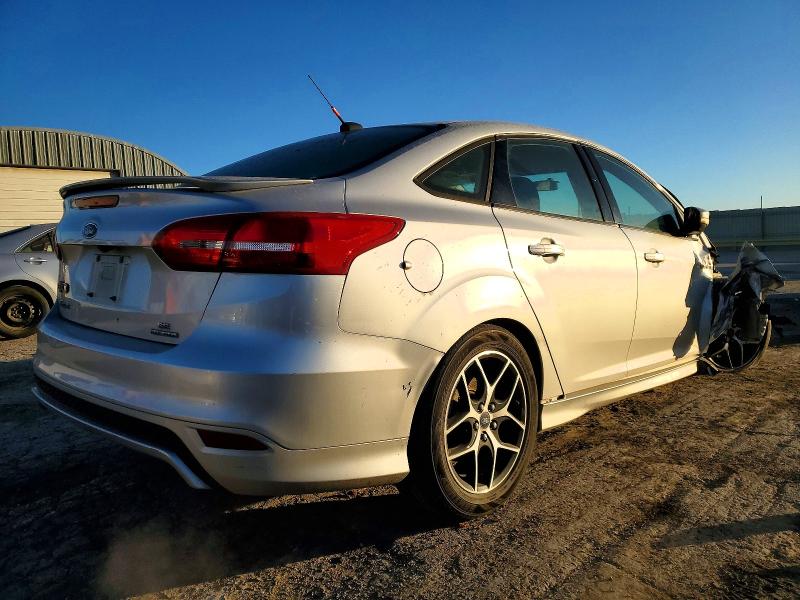 Photo 3 from auction – 2015 FORD FOCUS SE with VIN 1FADP3F28FL293781