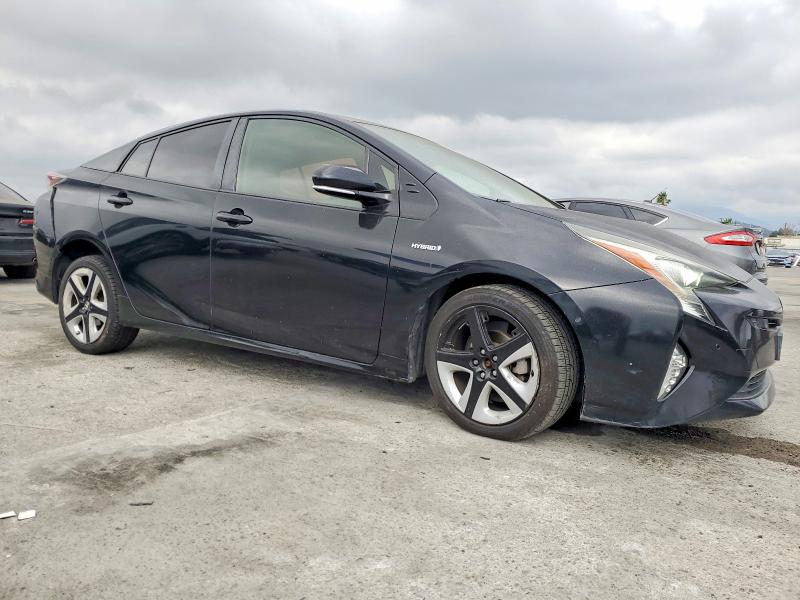 Photo 4 from auction – 2017 TOYOTA PRIUS with VIN JTDKARFU0H3049052