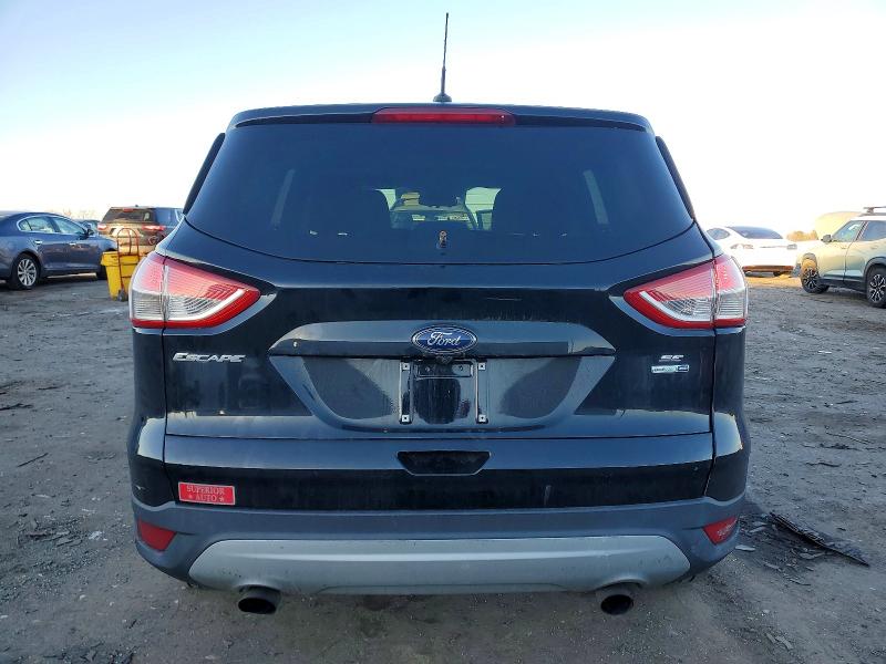Photo 6 from auction – 2016 FORD ESCAPE with VIN 1FMCU9G9XGUA69318