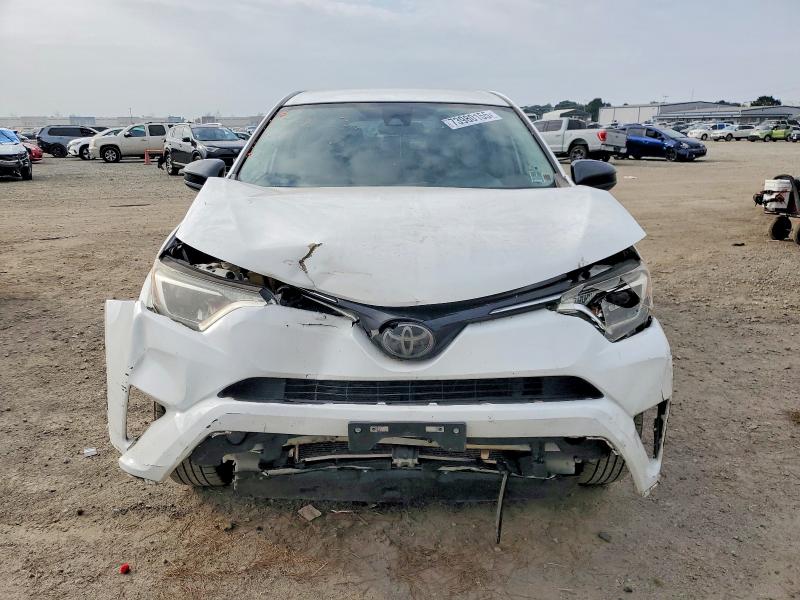 Photo 5 from auction – 2017 TOYOTA RAV4 LE with VIN JTMZFREV8HJ721459
