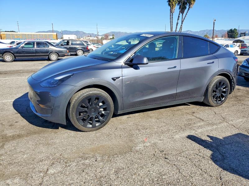 TESLA MODEL Y 2023 with VIN 7SAYGDED3PF962504 - Photo from auction