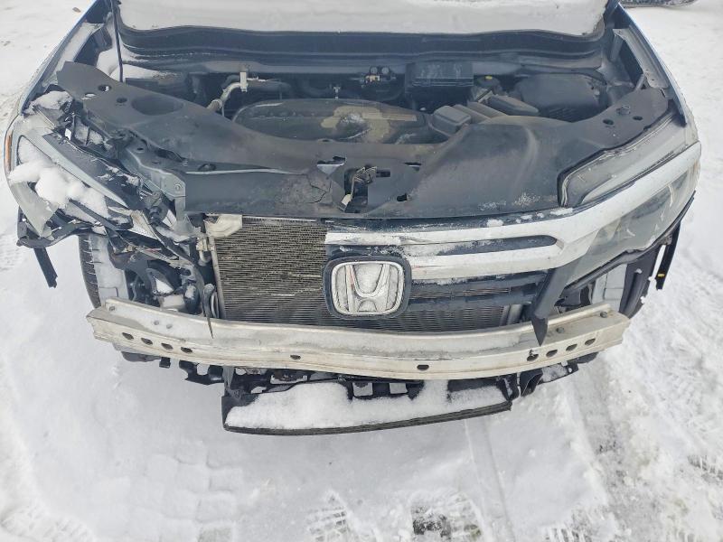 Photo 11 from auction – 2019 HONDA RIDGELINE with VIN 5FPYK3F14KB031312