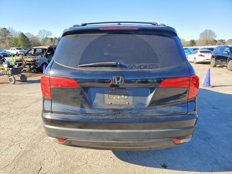Photo 6 from auction – 2016 HONDA PILOT ELIT with VIN 5FNYF6H07GB071622