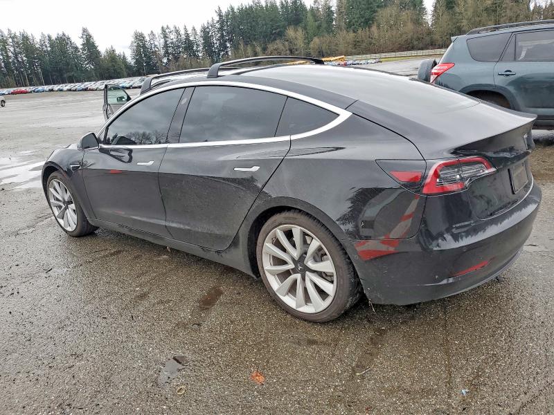 Photo 2 from auction – 2020 TESLA MODEL 3 with VIN 5YJ3E1EA6LF743712