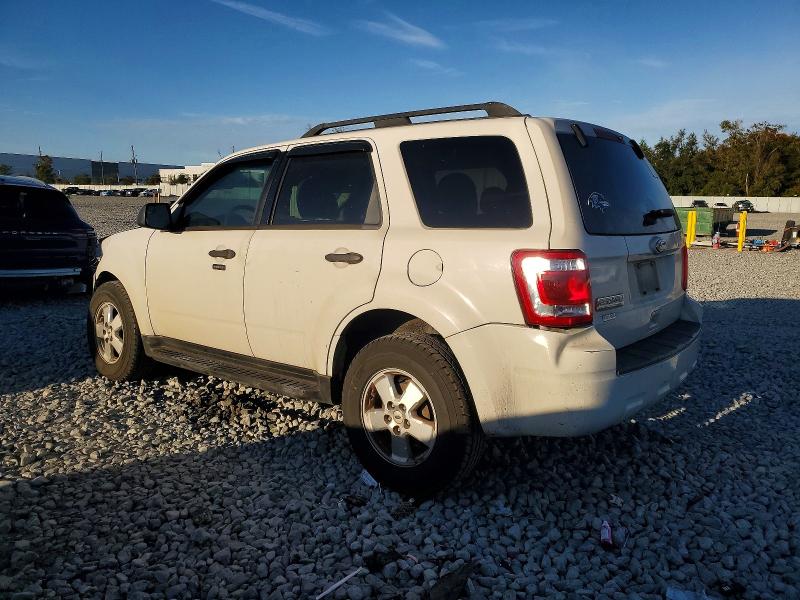 Photo 2 from auction – 2011 FORD ESCAPE with VIN 1FMCU0D75BKB44039