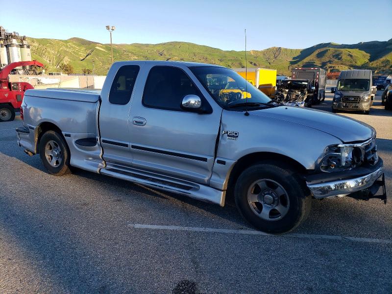 Photo 4 from auction – 2000 FORD F150 with VIN 2FTRX07W9YCA03741
