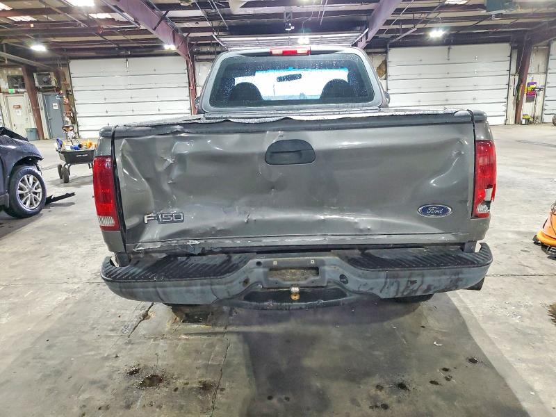 Photo 6 from auction – 2003 FORD F-150 KING with VIN 1FTRF18223NA64453