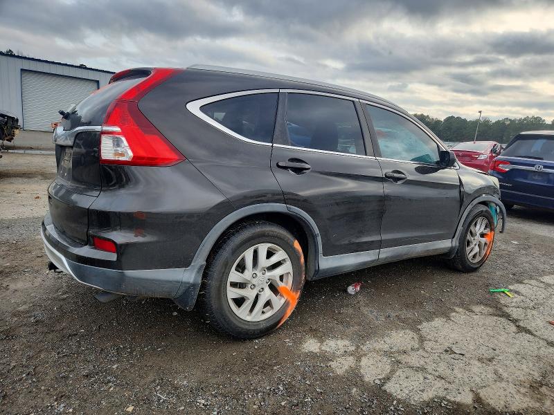 Photo 3 from auction – 2015 HONDA CR-V with VIN 2HKRM3H79FH538920