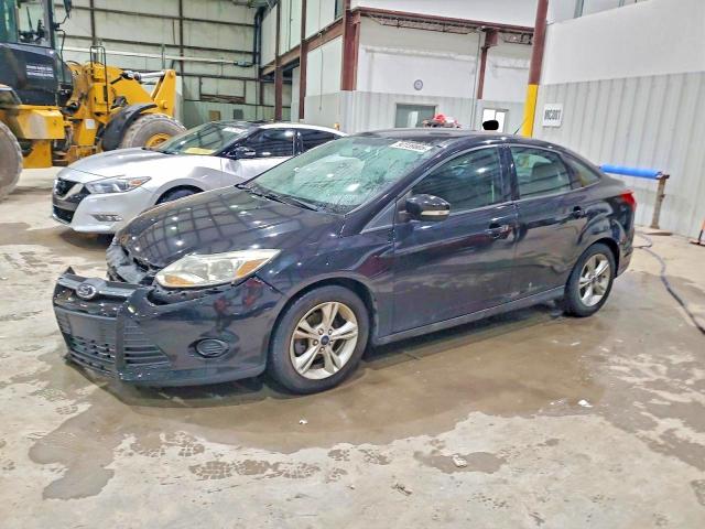 FORD FOCUS 2014 with VIN 1FADP3F2XEL414972 - Photo from auction