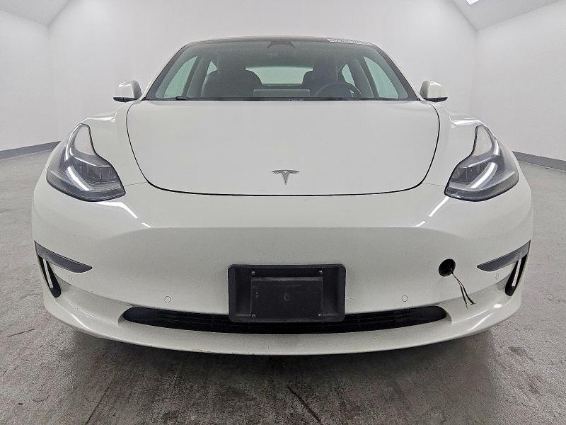 Photo 5 from auction – 2022 TESLA MODEL 3 with VIN 5YJ3E1EA7NF144109