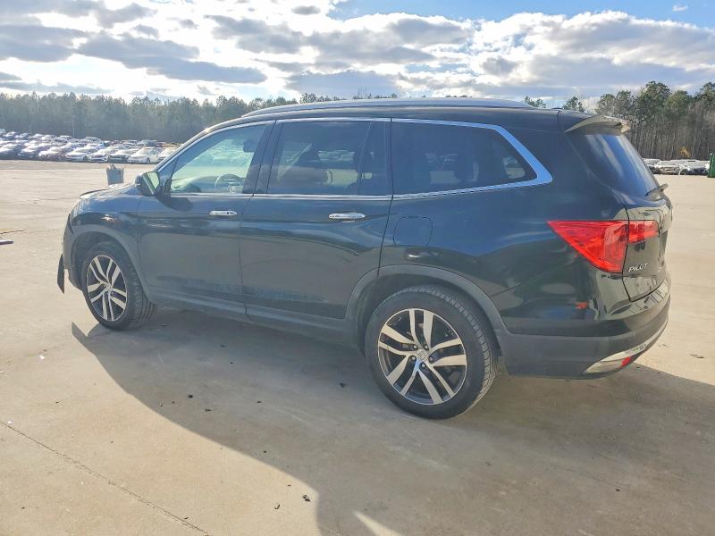 Photo 2 from auction – 2016 HONDA PILOT TOUR with VIN 5FNYF5H96GB043948