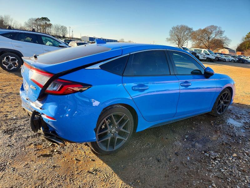 Photo 3 from auction – 2023 HONDA CIVIC SPOR with VIN 19XFL1H89PE014255
