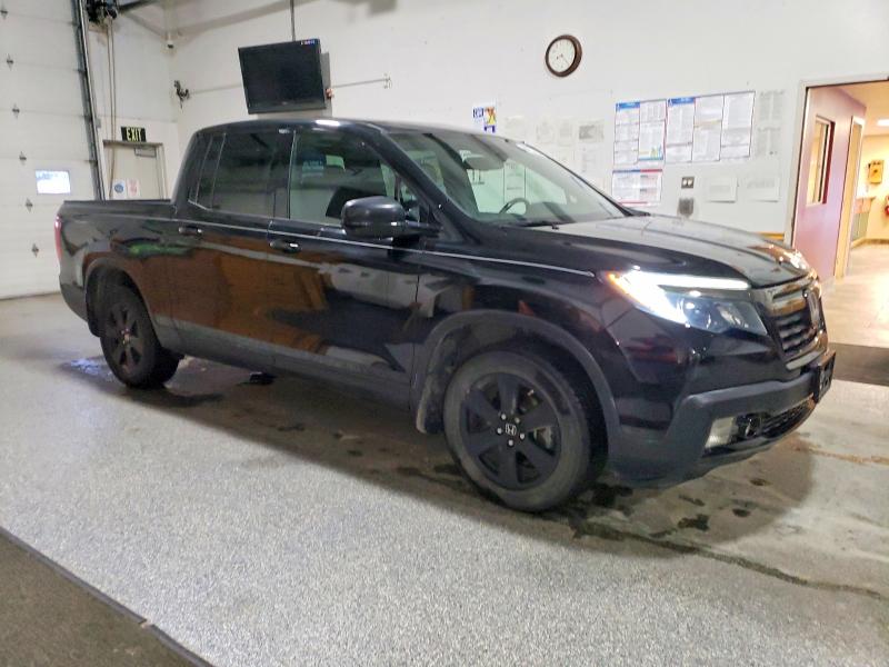Photo 4 from auction – 2018 HONDA RIDGELINE with VIN 5FPYK3F88JB005355
