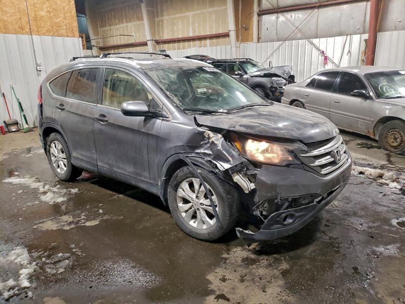 Photo 4 from auction – 2012 HONDA CR-V EXL with VIN JHLRM4H75CC023008