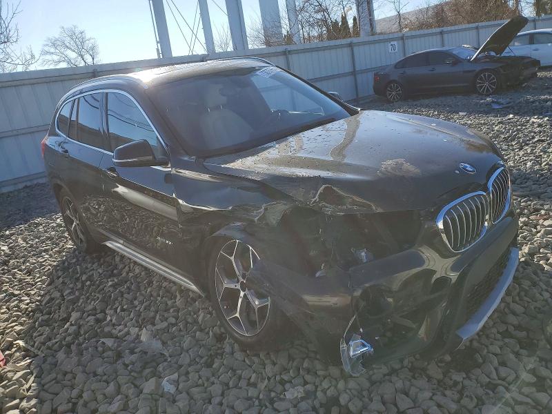 Photo 4 from auction – 2017 BMW X1 with VIN WBXHU7C33H5H33993