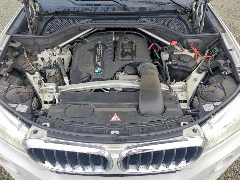 Photo 12 from auction – 2014 BMW X5 SDRIVE3 with VIN 5UXKR2C52E0H31619