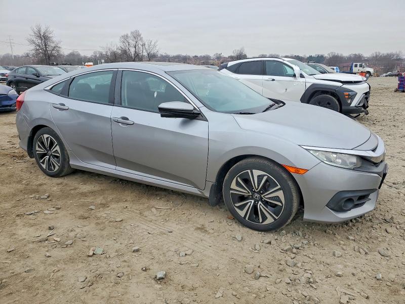 Photo 4 from auction – 2016 HONDA CIVIC EX with VIN 19XFC1F32GE222890