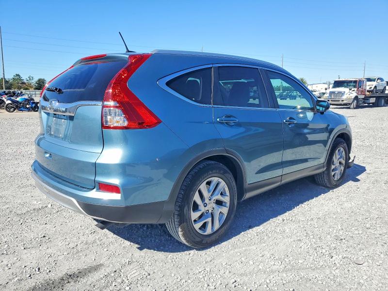 Photo 3 from auction – 2015 HONDA CR-V EXL with VIN 2HKRM3H79FH554602