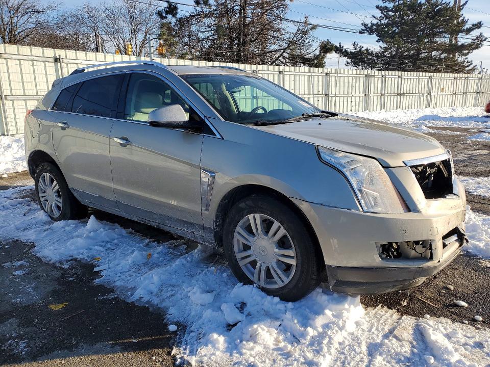 Photo 4 from auction – 2015 CADILLAC SRX LUXURY with VIN 3GYFNEE38FS640593