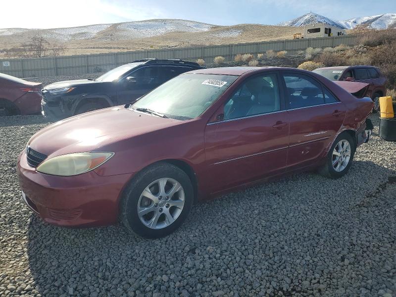 TOYOTA CAMRY LE 2002 with VIN JTDBF30K920050036 - Photo from auction
